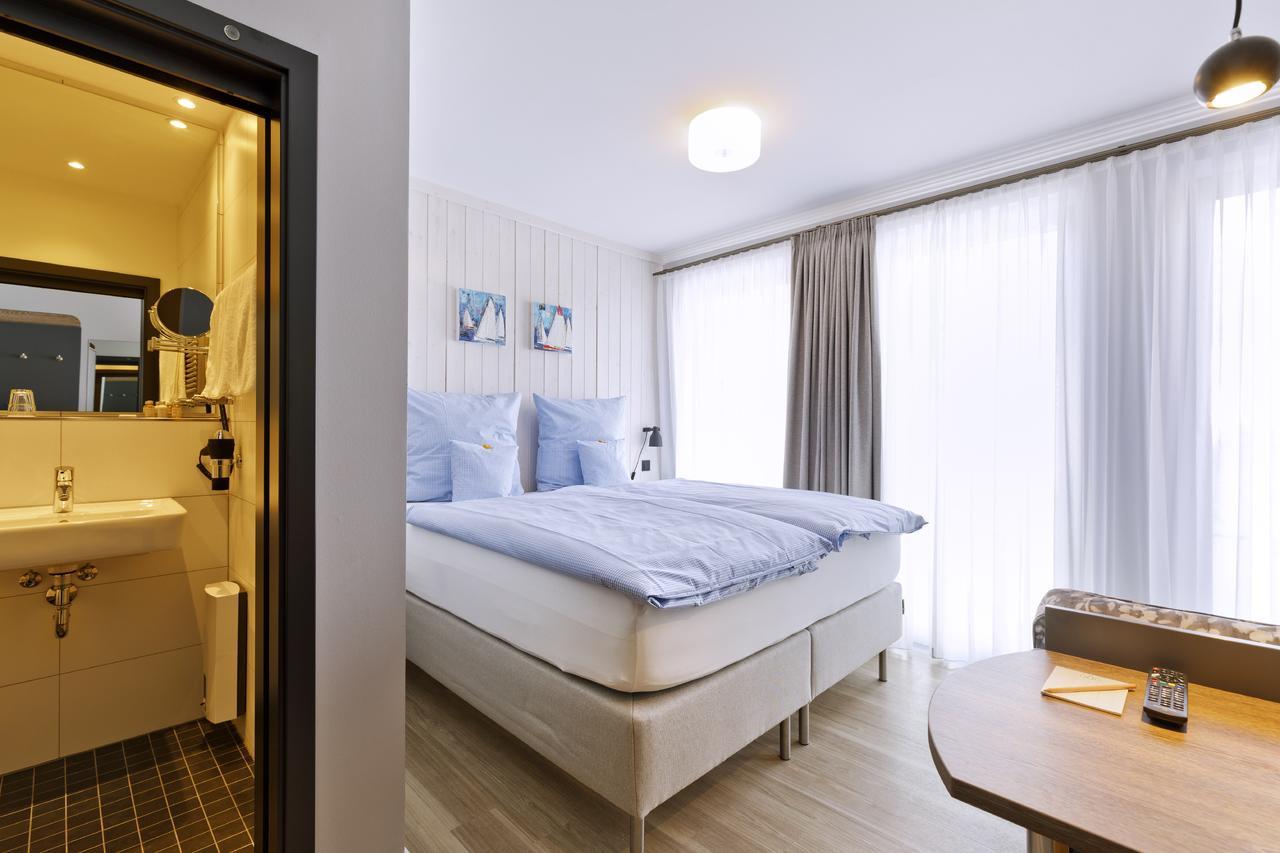 Logierhaus Rheintoreins Рийс Екстериор снимка